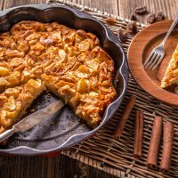 Apple pie Apple pie in baking pan with a slice removed
